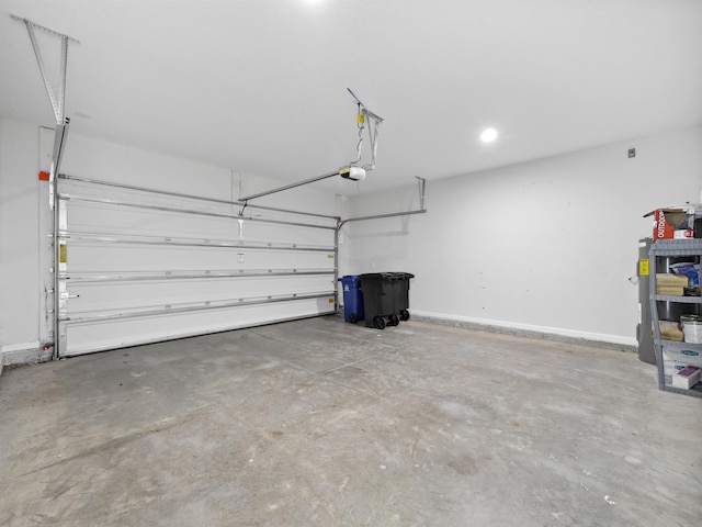 garage featuring a garage door opener