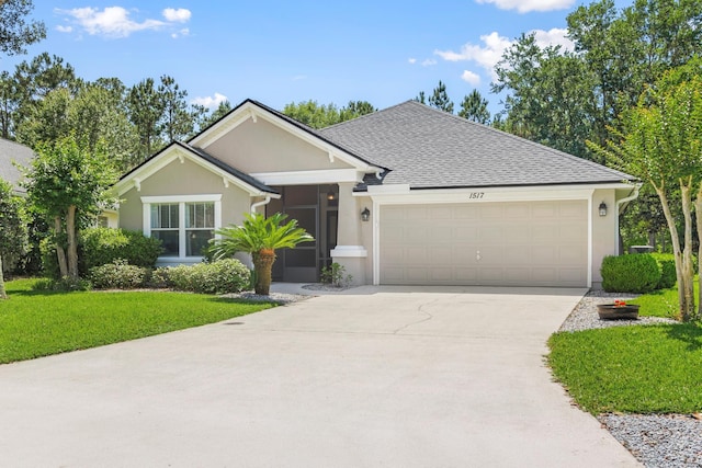 ranch-style house featuring an attached garage, concrete driveway, a front yard, stucco siding, and roof with shingles