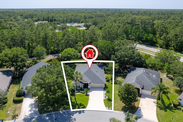 aerial view of property's location with a forest and property boundaries highlighted