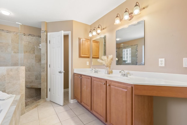 bathroom featuring a walk in shower, tile patterned floors, and double vanity