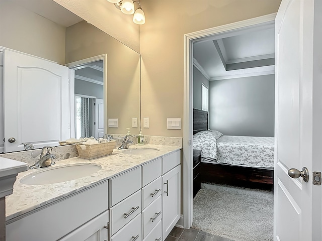 full bath featuring ornamental molding, ensuite bath, and double vanity