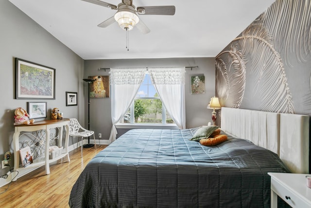 bedroom featuring wood-type flooring and ceiling fan