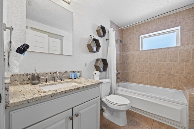 full bathroom featuring vanity, tile patterned floors, toilet, shower / bathtub combination with curtain, and a textured ceiling