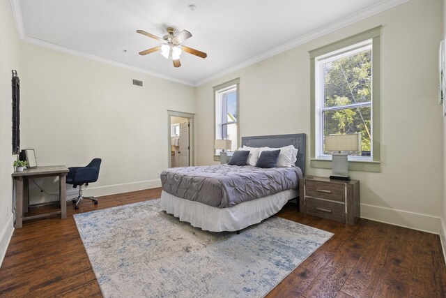 bedroom with ceiling fan, dark hardwood / wood-style flooring, and multiple windows