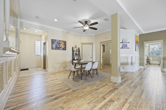 dining area with ceiling fan, plenty of natural light, and light wood-type flooring