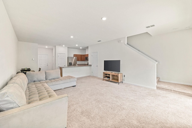 69 Mustard Hill Ct, Saint Augustine, FL 32086 - living area with stairs, light carpet, recessed lighting, and baseboards