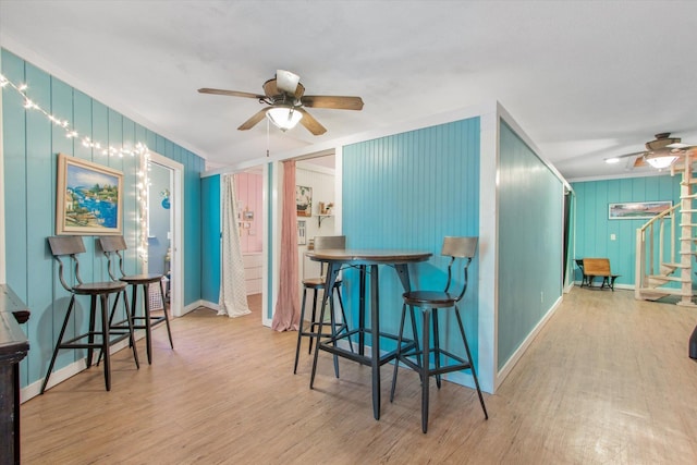 1440 Corunna St, Saint Augustine, FL 32080 - dining area with stairway, baseboards, wood finished floors, and a ceiling fan