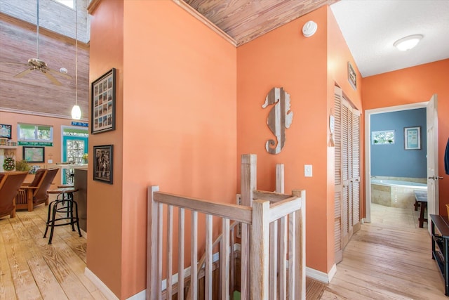 1440 Corunna St, Saint Augustine, FL 32080 - hallway with an upstairs landing, visible vents, wood-type flooring, and baseboards