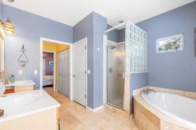 1440 Corunna St, Saint Augustine, FL 32080 - bathroom with vanity, a bath, a stall shower, and ensuite bathroom