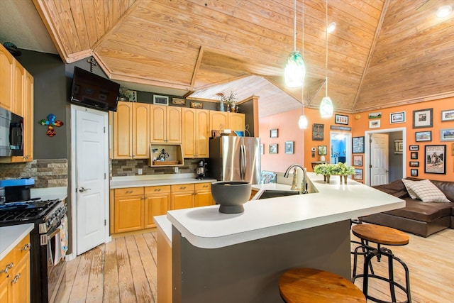 1440 Corunna St, Saint Augustine, FL 32080 - kitchen with wood ceiling, tasteful backsplash, appliances with stainless steel finishes, and a sink