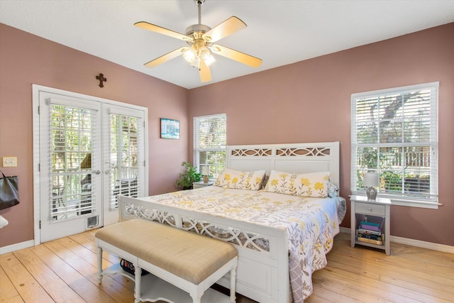 1440 Corunna St, Saint Augustine, FL 32080 - bedroom with baseboards, light wood-style flooring, ceiling fan, access to exterior, and french doors
