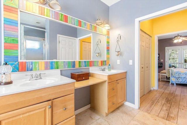 1440 Corunna St, Saint Augustine, FL 32080 - ensuite bathroom with baseboards, ensuite bathroom, a closet, vanity, and a ceiling fan