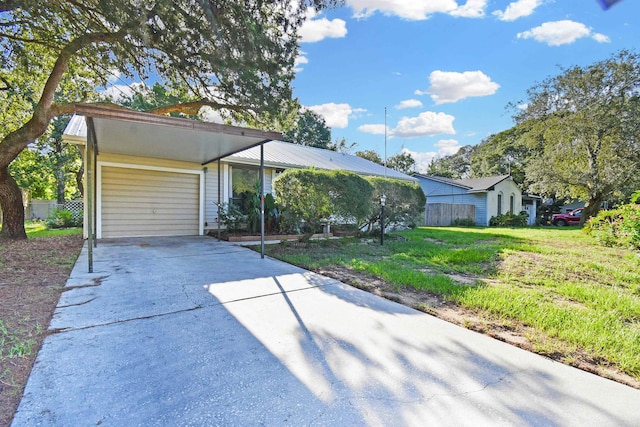 mid-century modern home featuring an attached garage and driveway