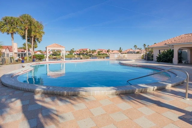 view of pool featuring a patio area