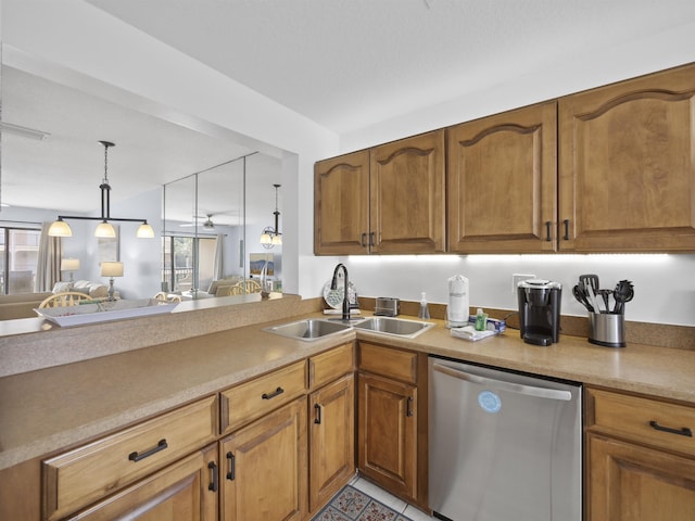 kitchen featuring dishwasher, ceiling fan, plenty of natural light, and sink