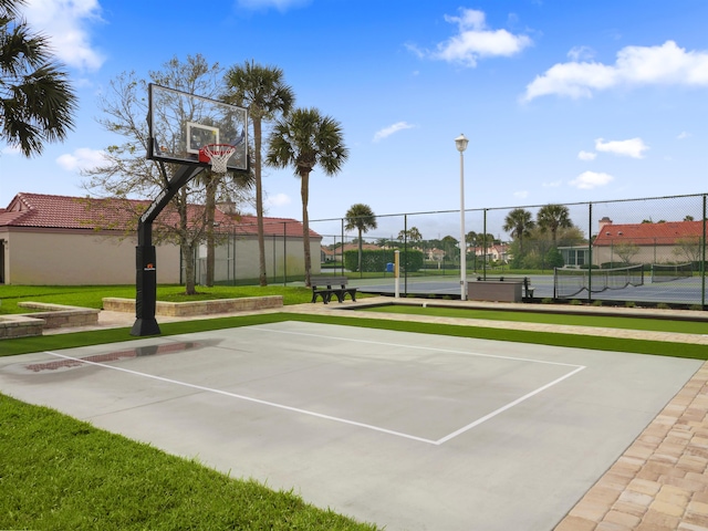 view of basketball court with tennis court