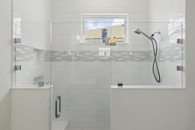 bathroom with an enclosed shower