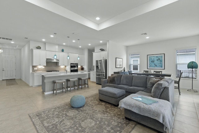 tiled living room with sink