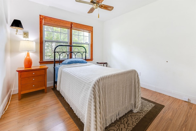 bedroom featuring ceiling fan and light wood-type flooring