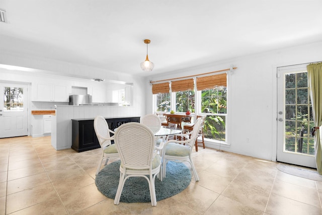 dining room with light tile patterned floors