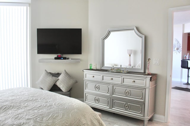 bedroom featuring light wood-type flooring