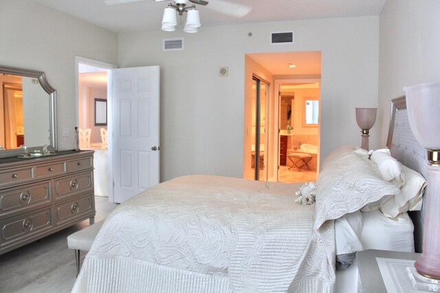 bedroom featuring ceiling fan and connected bathroom