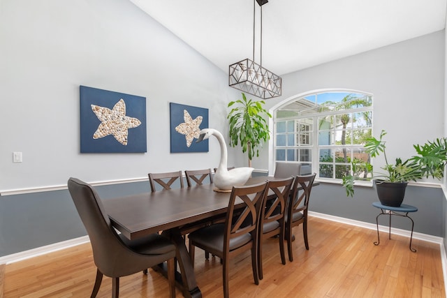 dining area with light hardwood / wood-style floors