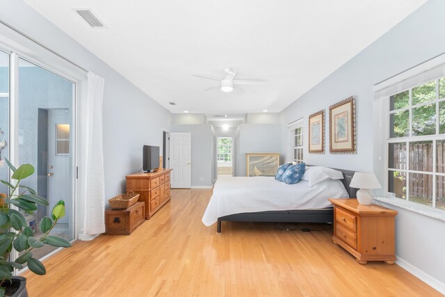 bedroom featuring light hardwood / wood-style floors and ceiling fan