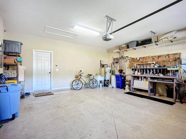 garage featuring a workshop area and a garage door opener