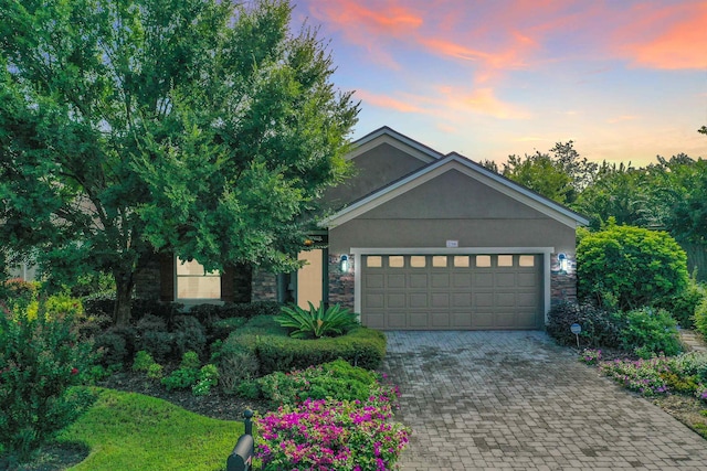 view of front of property featuring a garage