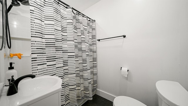 1403 S 15th St, Palatka, FL 32177 - bathroom with a shower with curtain, a sink, and toilet