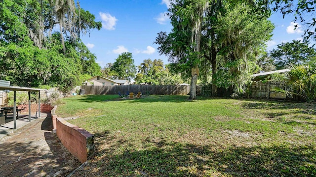 1403 S 15th St, Palatka, FL 32177 - view of yard featuring a patio area and a fenced backyard