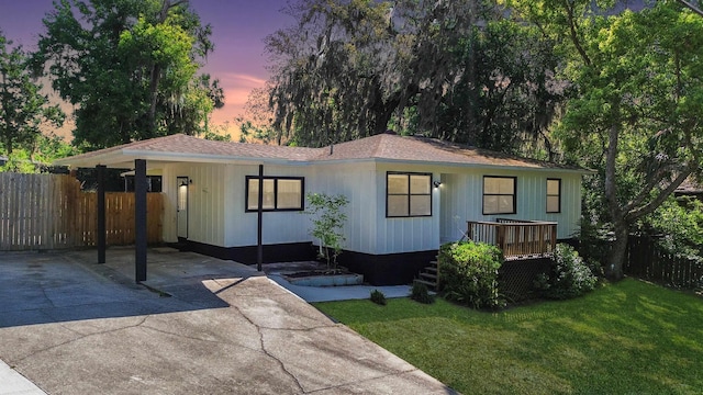 1403 S 15th St, Palatka, FL 32177 - single story home with a carport, a yard, driveway, and fence