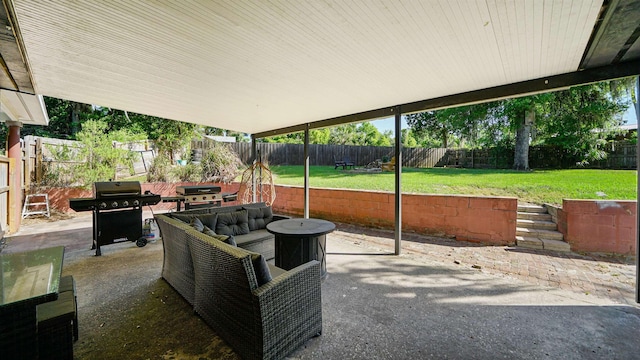 1403 S 15th St, Palatka, FL 32177 - view of patio with an outdoor living space, a fenced backyard, and area for grilling