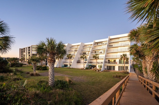 view of outdoor building at dusk