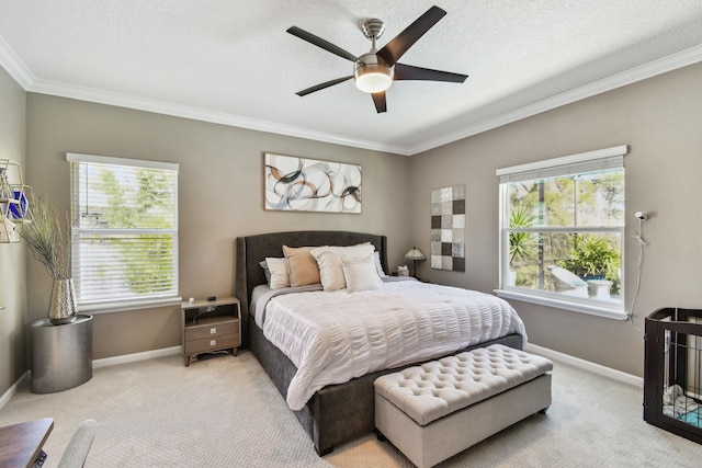 bedroom with baseboards, ornamental molding, and light colored carpet