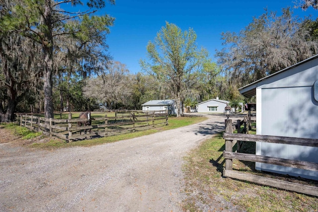 view of street featuring driveway