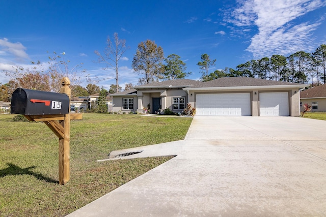 view of front of house featuring a garage and a front lawn