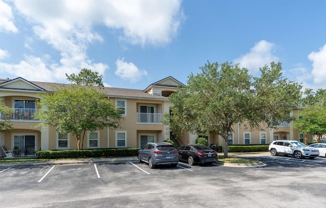 2251 Golden Lake Loop, Saint Augustine, FL 32084 - view of property with uncovered parking and stairway