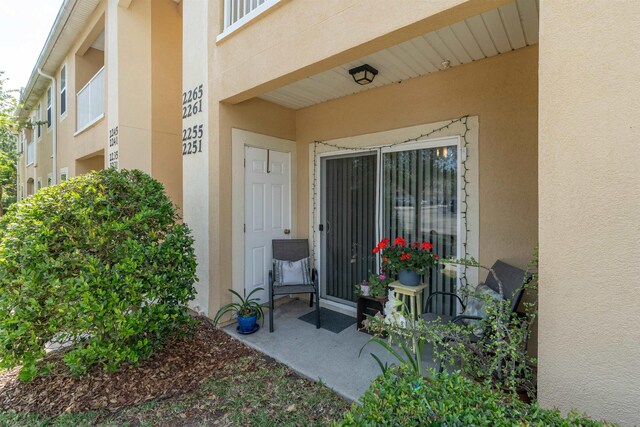 2251 Golden Lake Loop, Saint Augustine, FL 32084 - entrance to property featuring stucco siding