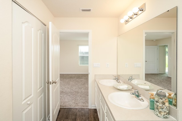 2730 Oak Stream Dr, Green Cove Springs, FL 32043 - full bath with double vanity and wood finished floors