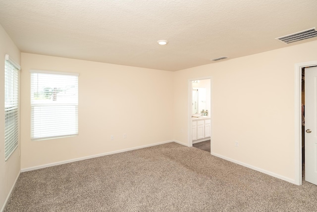 2730 Oak Stream Dr, Green Cove Springs, FL 32043 - unfurnished room with carpet floors, a textured ceiling, and recessed lighting