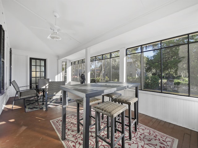 sunroom with vaulted ceiling and ceiling fan