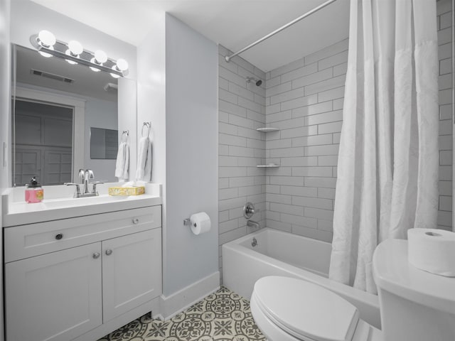 full bathroom with vanity, shower / tub combo, tile patterned floors, and toilet