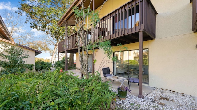 back of house with a patio area