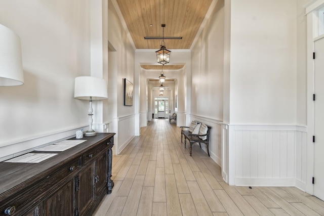 182 Myrtle Oak Ct, Saint Augustine, FL 32092 - corridor featuring wood ceiling, light wood-style floors, and wainscoting