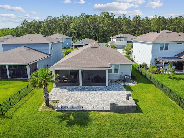 182 Myrtle Oak Ct, Saint Augustine, FL 32092 - back of property with a sunroom, central AC unit, a patio, a residential view, and a shingled roof