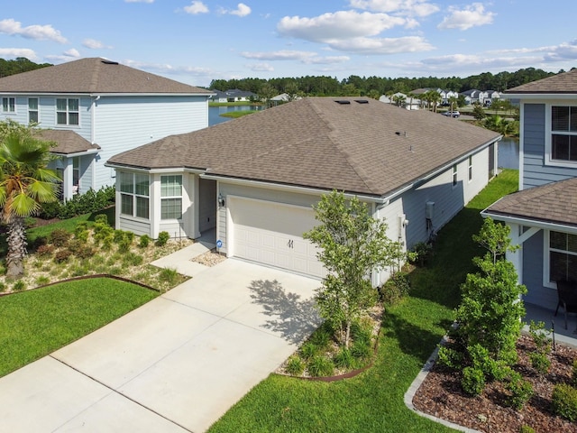 182 Myrtle Oak Ct, Saint Augustine, FL 32092 - view of front of house featuring a shingled roof, a garage, concrete driveway, and a front lawn