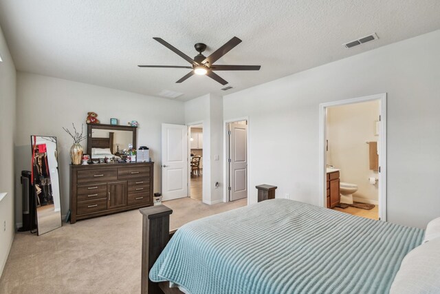 182 Myrtle Oak Ct, Saint Augustine, FL 32092 - bedroom featuring light carpet, a textured ceiling, a ceiling fan, and ensuite bath