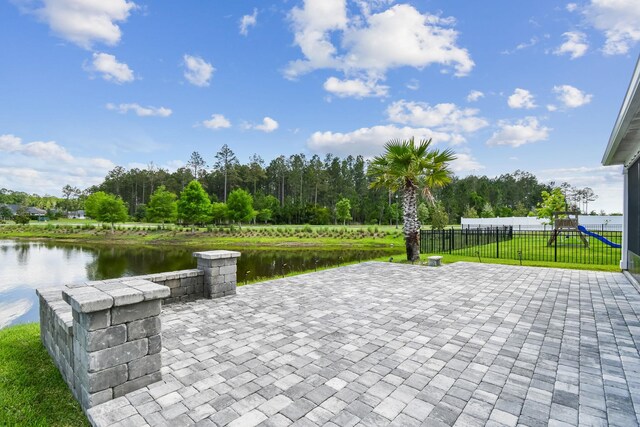 182 Myrtle Oak Ct, Saint Augustine, FL 32092 - view of patio / terrace with a playground and a water view
